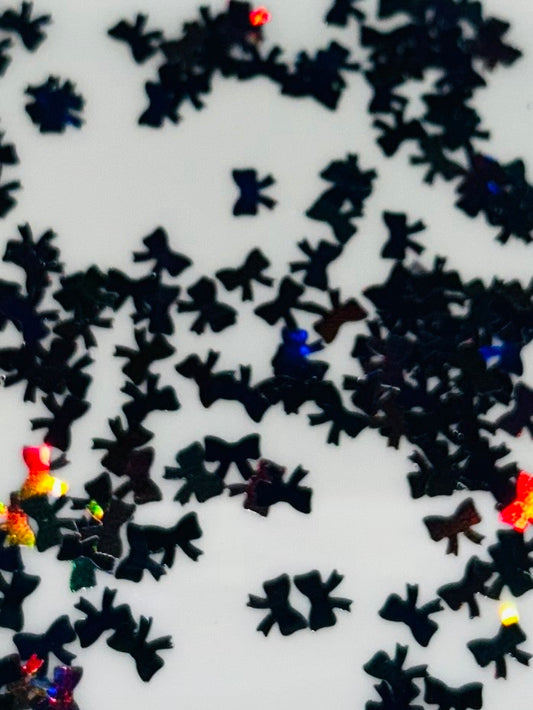 Black bows shape glitter